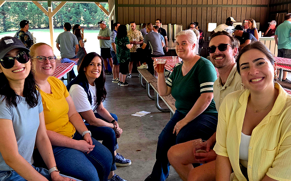 Group seated at community gathering